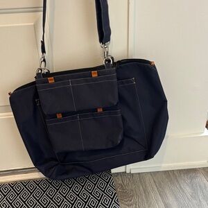 Elegant Navy Tote with Brown Details